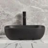 Czarna umywalka nablatowa ceramiczna 46x32 cm stawiana na blat