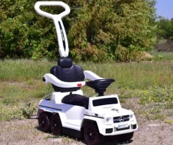 JEŹDZIK NA AKUMULATOR, PCHACZ, ODPYCHACZ MERCEDES G 63 AMG 6X6, MIĘKKIE KOŁA, DASZEK , STEROWANIE RĄCZKĄ /1838 LONG