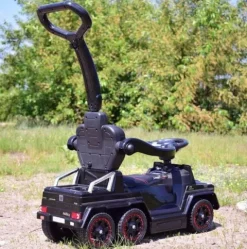 JEŹDZIK NA AKUMULATOR, PCHACZ, ODPYCHACZ MERCEDES G 63 AMG 6X6, MIĘKKIE KOŁA, DASZEK , STEROWANIE RĄCZKĄ /1838 LONG