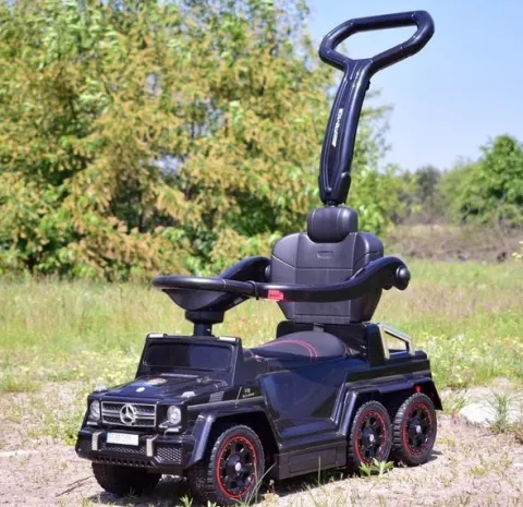 JEŹDZIK NA AKUMULATOR, PCHACZ, ODPYCHACZ MERCEDES G 63 AMG 6X6, MIĘKKIE KOŁA, DASZEK , STEROWANIE RĄCZKĄ /1838 LONG