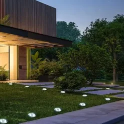 LAMPA SOLARNA OGRODOWA LAMPKI LED GRUNTOWE DYSK CZUJNIK ZMIERZCHU 12 DYSKÓW