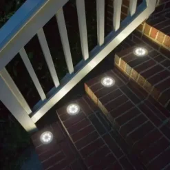LAMPA SOLARNA OGRODOWA LAMPKI LED GRUNTOWE DYSK CZUJNIK ZMIERZCHU 12 DYSKÓW