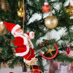 MIKOŁAJ WSPINAJĄCY SIĘ NA LINIE 100CM MELODYJKA NA PREZENT ŚWIĘTA WCHODZĄCY