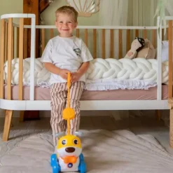 WOOPIE Interaktywny Piesek 2w1 Pchacz Szczekający 360° 6m+