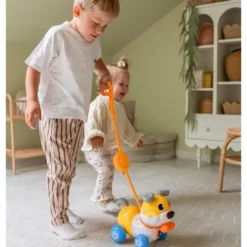 WOOPIE Interaktywny Piesek 2w1 Pchacz Szczekający 360° 6m+